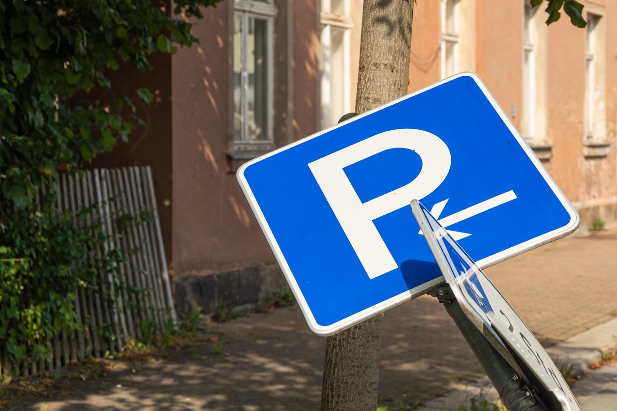 damaged bent traffic sign